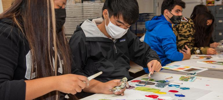 students working on art project